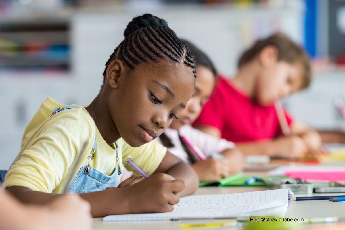 child taking a test